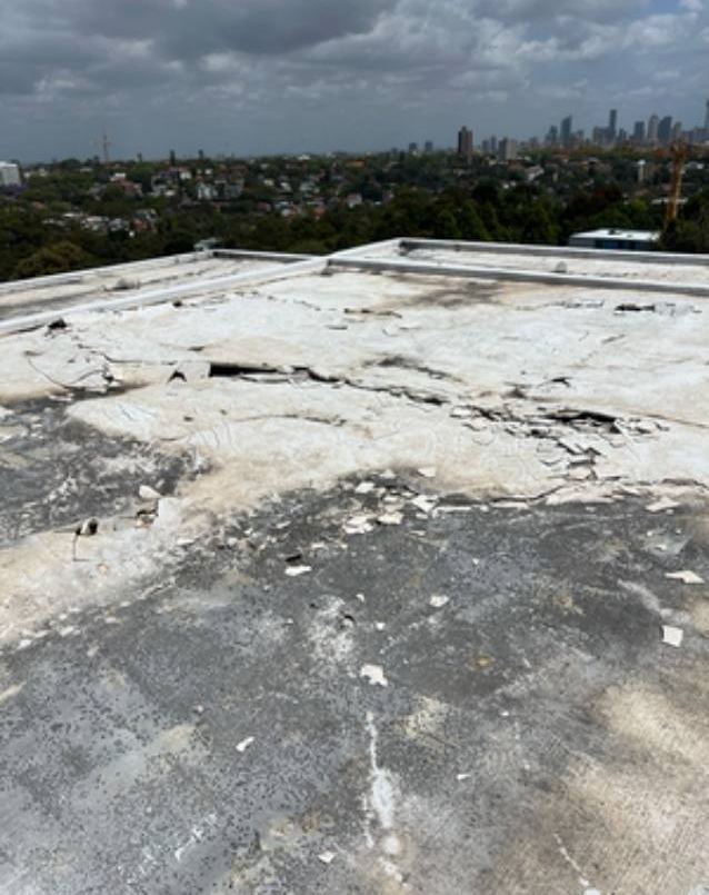 Rooftop with failed, cracked waterproofing membrane