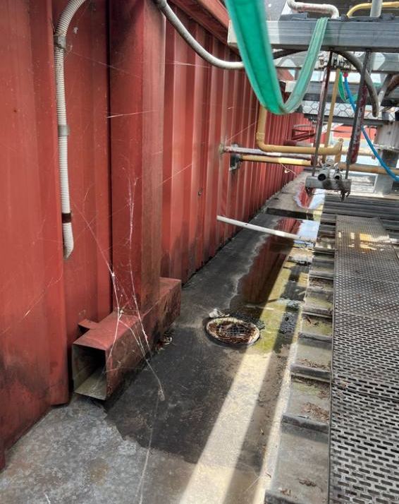Box gutter with bitumen below wall penetrations